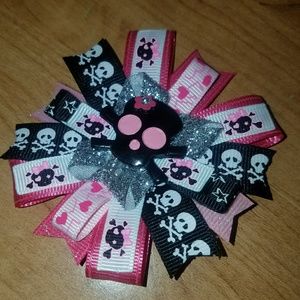 Pink and black skull bow